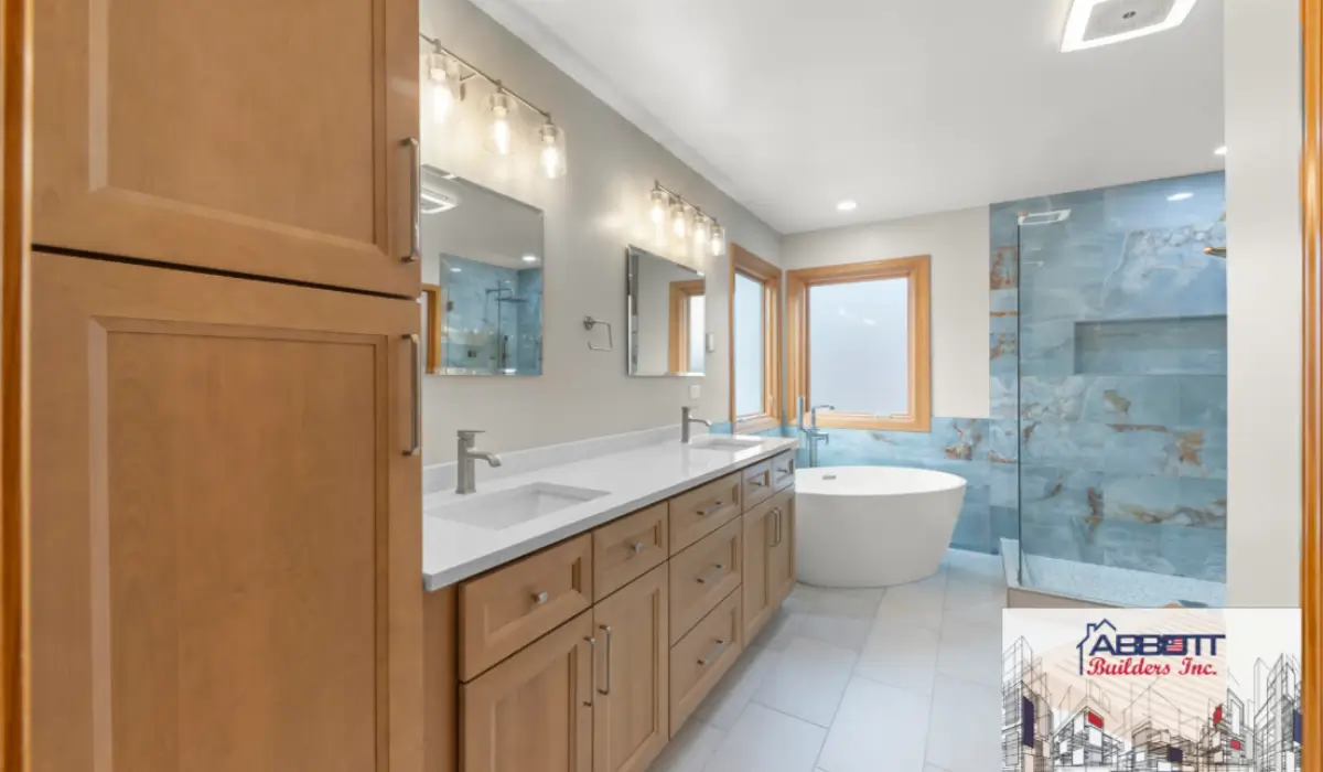 Bathroom Trends for 2026 featuring blue slab shower and a freestanding soaking tub.